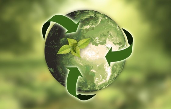 Sustainability pic: green earth circled by green arrows